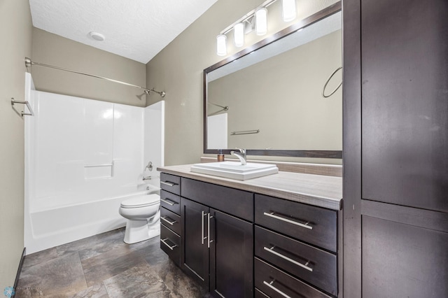 bathroom with toilet, vanity, and bathing tub / shower combination