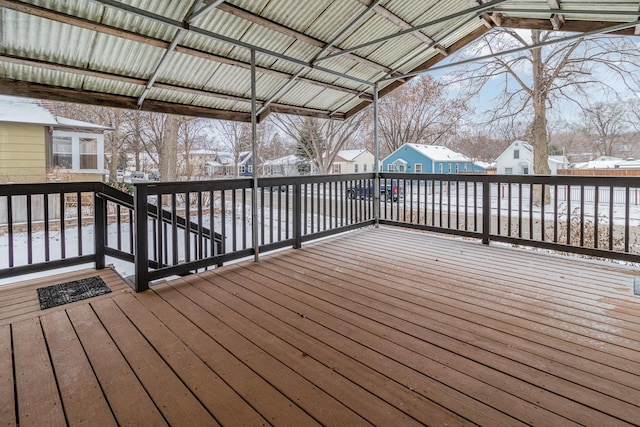 view of snow covered deck