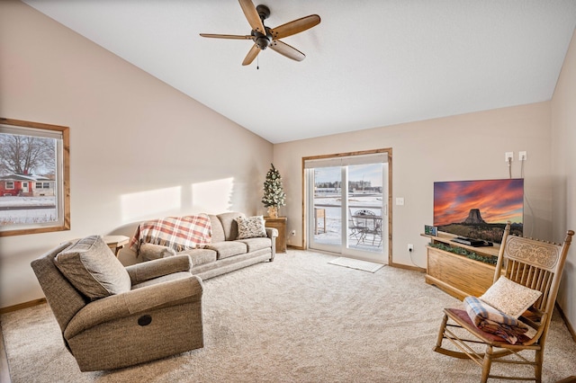 living room with ceiling fan, carpet flooring, and high vaulted ceiling