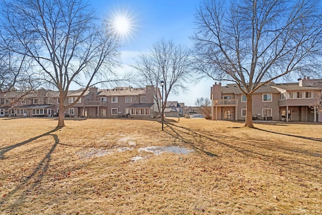 view of yard featuring a residential view