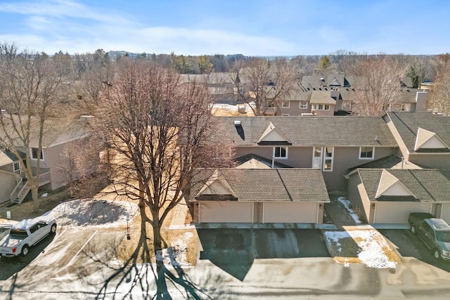 drone / aerial view with a residential view