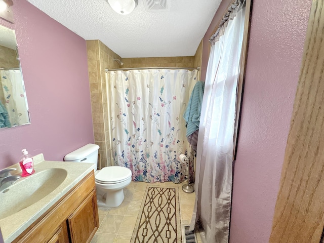 bathroom featuring toilet, vanity, a textured ceiling, and curtained shower