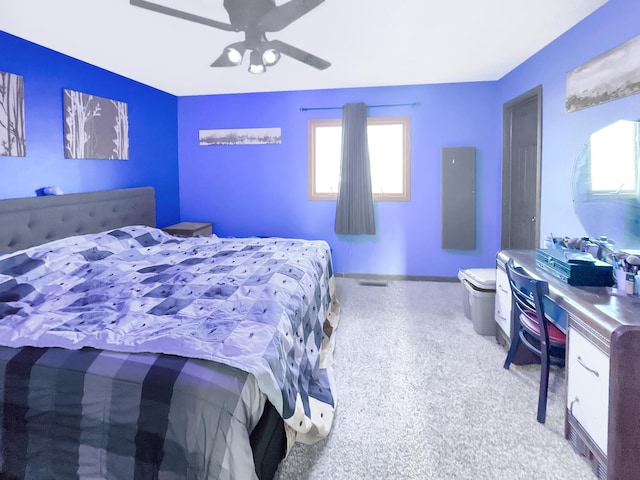 carpeted bedroom with ceiling fan