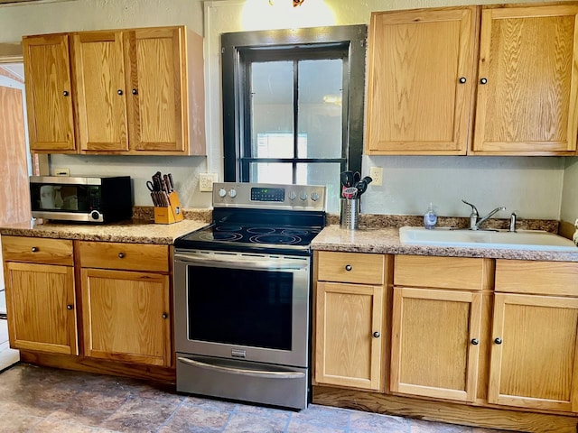 kitchen featuring sink and appliances with stainless steel finishes