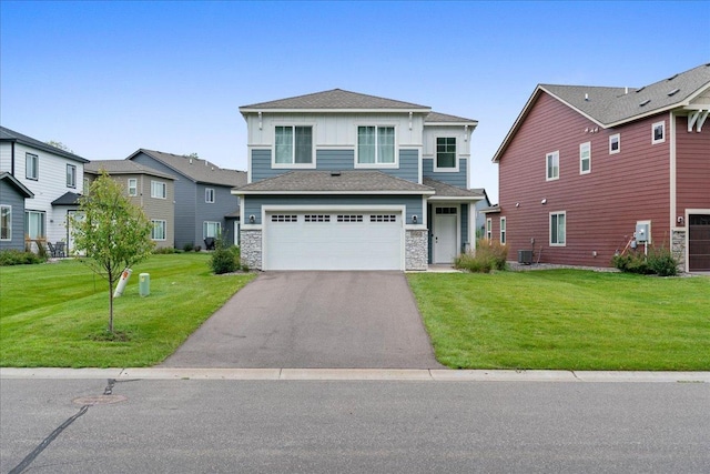 view of front of home with cooling unit, driveway, stone siding, a residential view, and a front yard