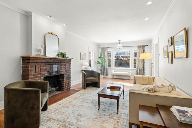 living room with a brick fireplace and crown molding