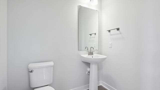 bathroom featuring toilet