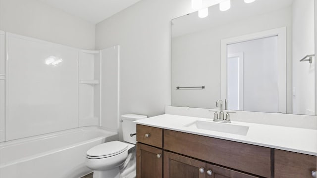 full bathroom featuring tub / shower combination, toilet, and vanity