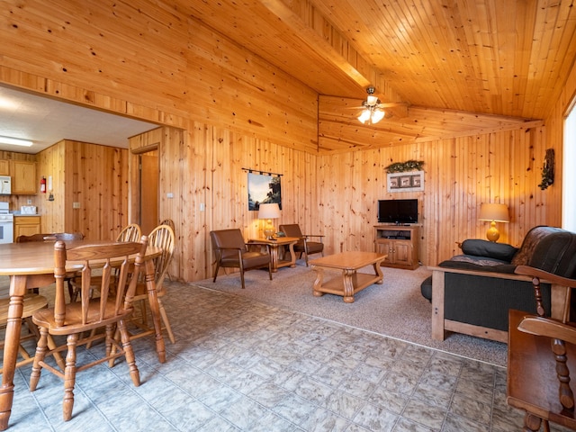 dining space featuring ceiling fan, vaulted ceiling, and wood ceiling