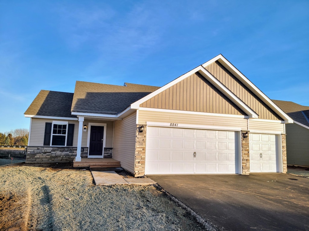 craftsman-style house with a garage