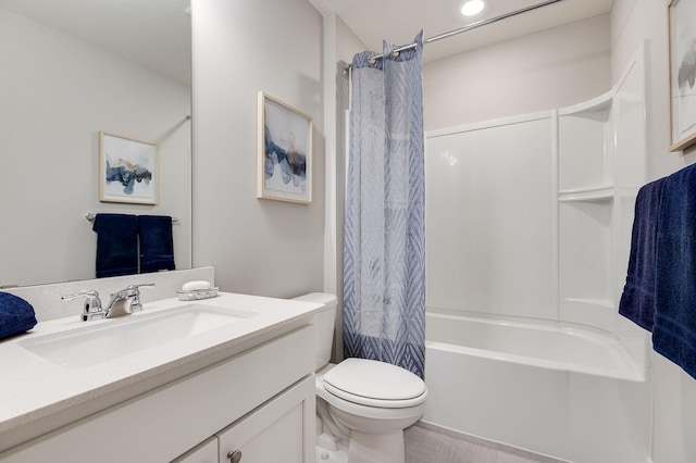 full bathroom featuring shower / bathtub combination with curtain, vanity, and toilet