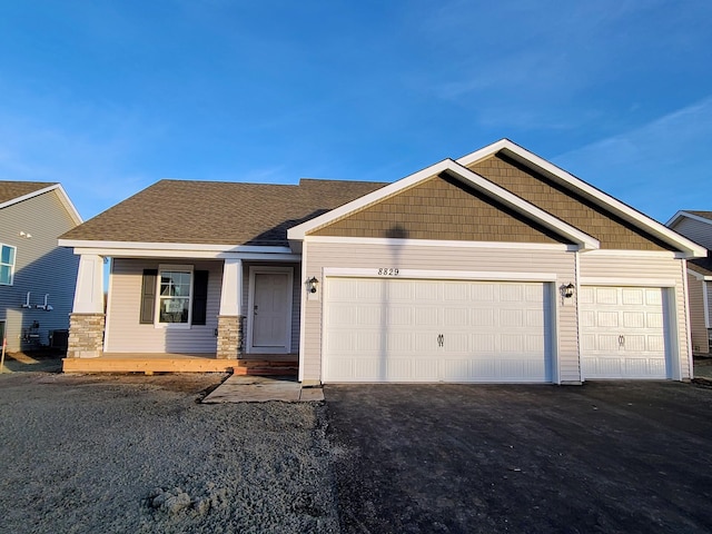 craftsman-style house with a garage