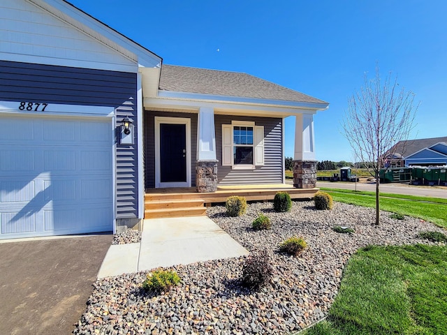 property entrance with a garage