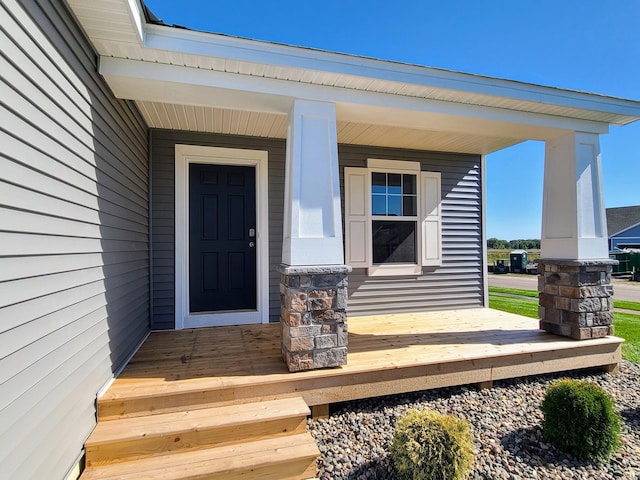 entrance to property with covered porch