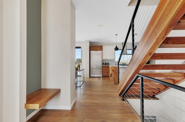 hall featuring light hardwood / wood-style floors