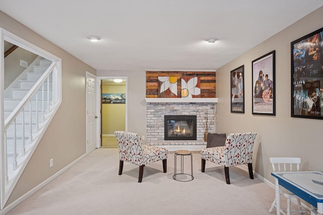 2500 Urbandale Ln N, Plymouth, MN 55447 - living area featuring carpet flooring, a brick fireplace, and stairway