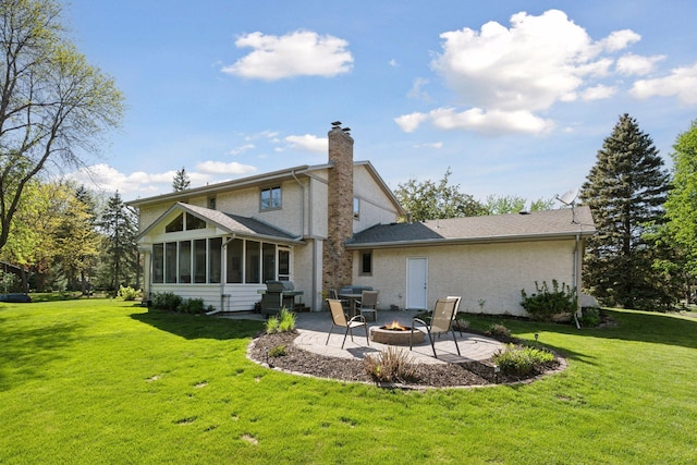 2500 Urbandale Ln N, Plymouth, MN 55447 - back of property with a patio area, a fire pit, a sunroom, and a yard