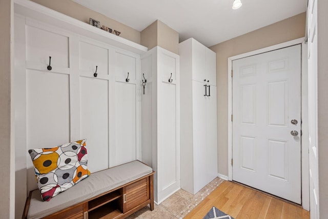 2500 Urbandale Ln N, Plymouth, MN 55447 - mudroom with light wood-style flooring and baseboards