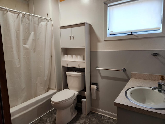 full bathroom featuring toilet, shower / bath combination with curtain, and vanity