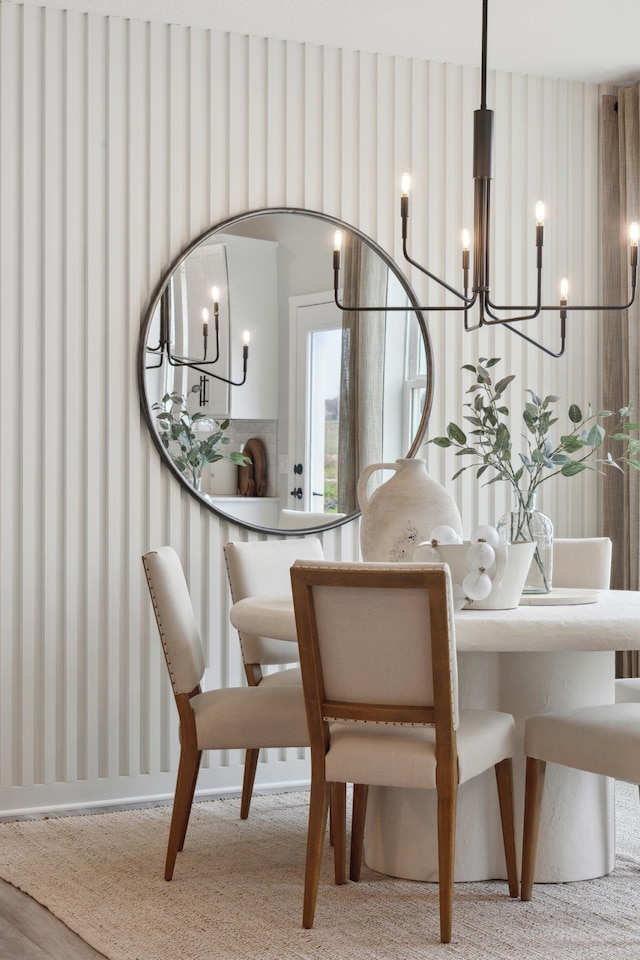 dining space featuring an inviting chandelier