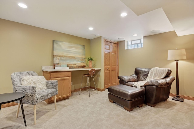 living area with recessed lighting, baseboards, and light colored carpet