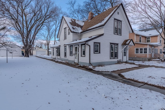 view of snow covered property