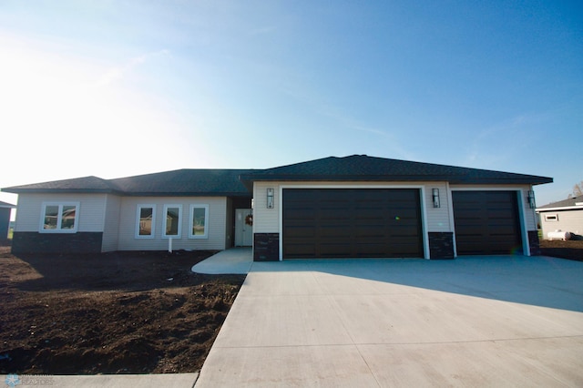 view of front of property with a garage