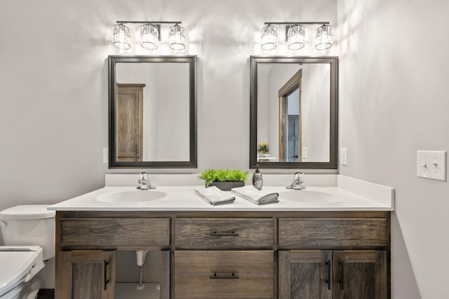 9971 14th Cir NE, Saint Michael, MN 55376 - bathroom featuring toilet and double vanity