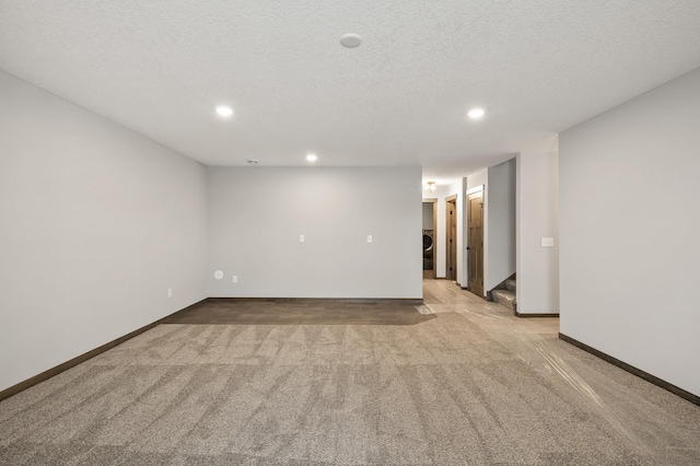 9971 14th Cir NE, Saint Michael, MN 55376 - empty room featuring light colored carpet, recessed lighting, stairway, baseboards, and a textured ceiling