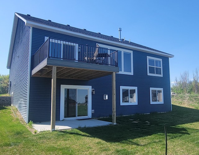 9971 14th Cir NE, Saint Michael, MN 55376 - back of house with a patio area, a lawn, and a balcony