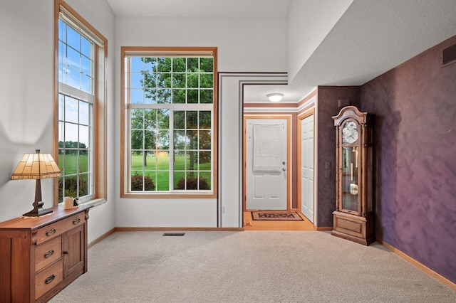 interior space featuring a textured ceiling