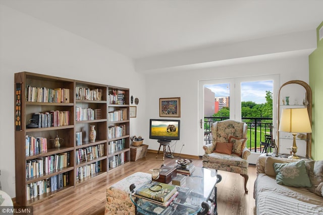 sitting room featuring light hardwood / wood-style flooring