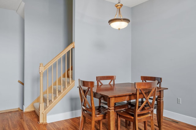 dining area featuring hardwood / wood-style flooring