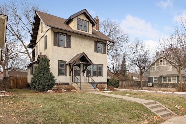 view of front facade featuring a front yard