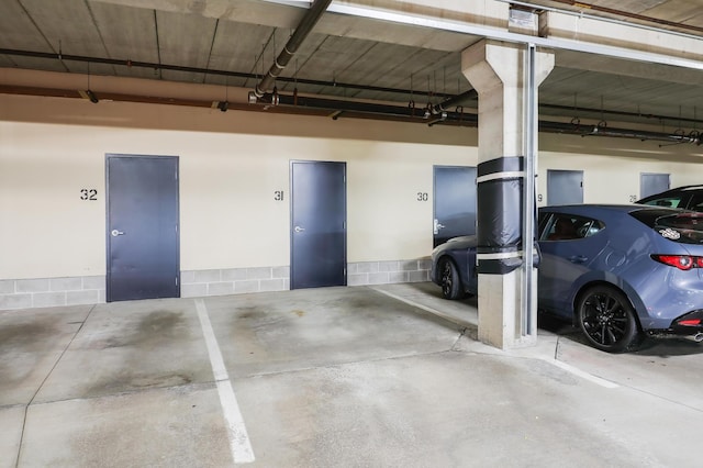 garage featuring a carport