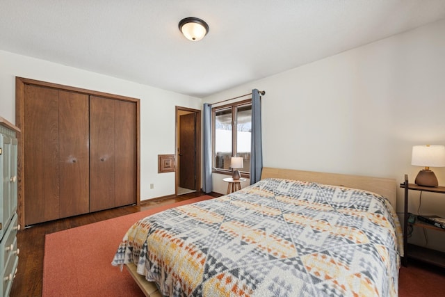 bedroom featuring wood finished floors