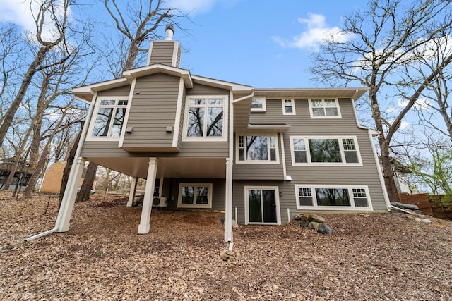 297 Glenbrook Rd N, Wayzata, MN 55391 - back of house with a chimney