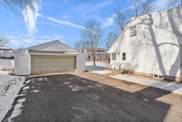 view of snow covered garage