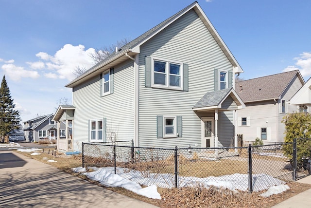 view of front of property featuring a fenced front yard and a residential view