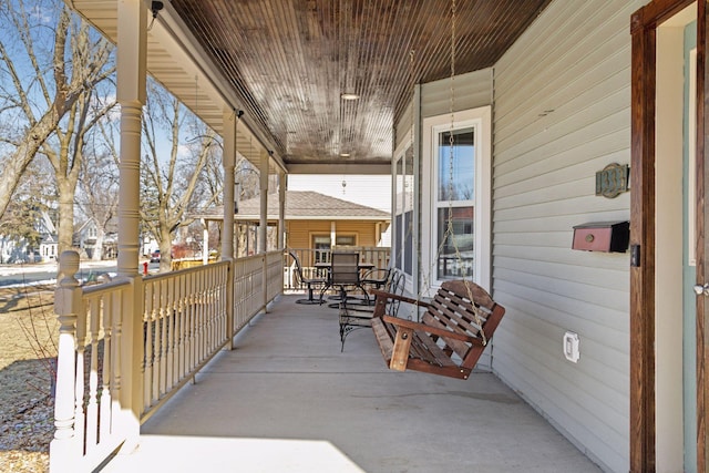 view of patio featuring a porch