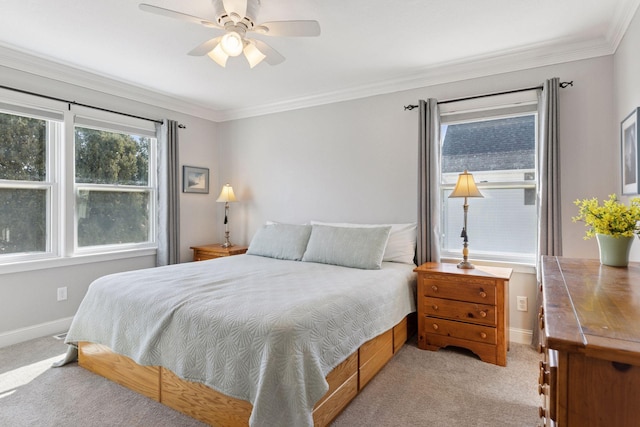 bedroom with ceiling fan, baseboards, light carpet, and ornamental molding