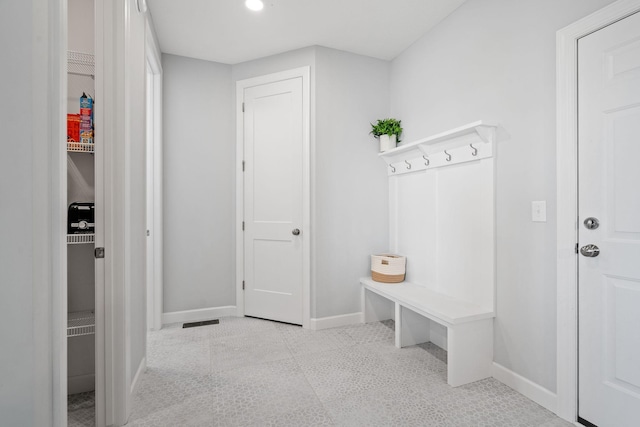 mudroom featuring baseboards