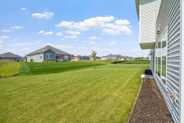 view of yard with a residential view