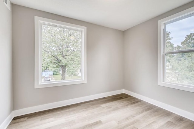 empty room featuring light hardwood / wood-style floors