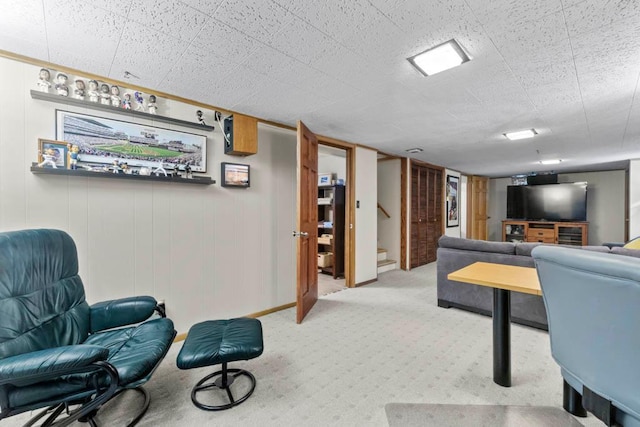 interior space featuring stairs, baseboards, and carpet floors