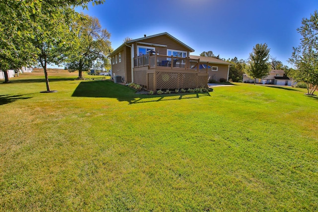 view of yard with a deck