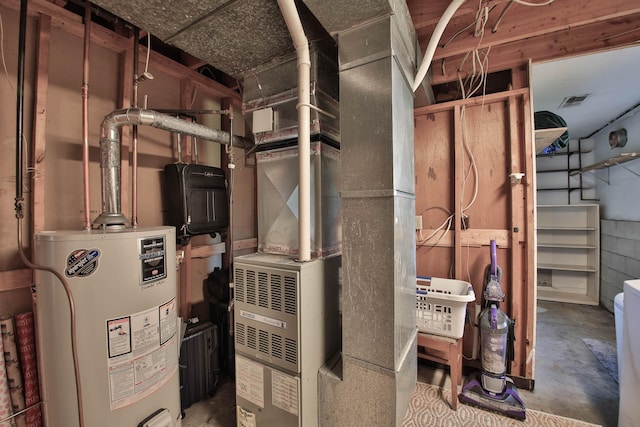 utility room with gas water heater