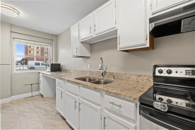 kitchen with extractor fan, sink, stainless steel range with electric cooktop, light stone counters, and white cabinets