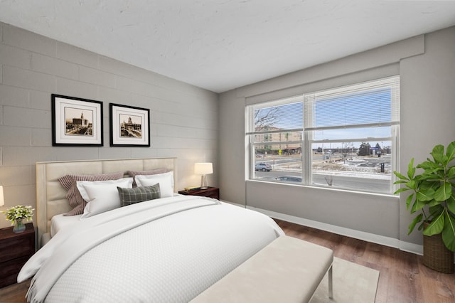 bedroom featuring dark wood-type flooring