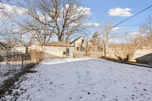 view of yard covered in snow